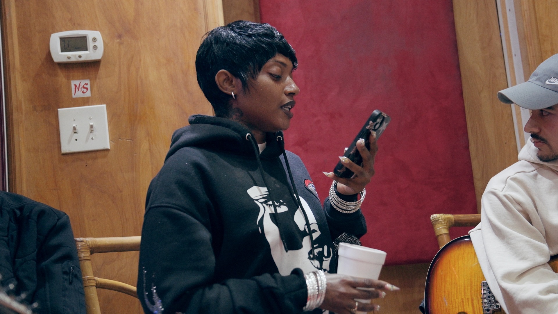 Candid moment during the studio session